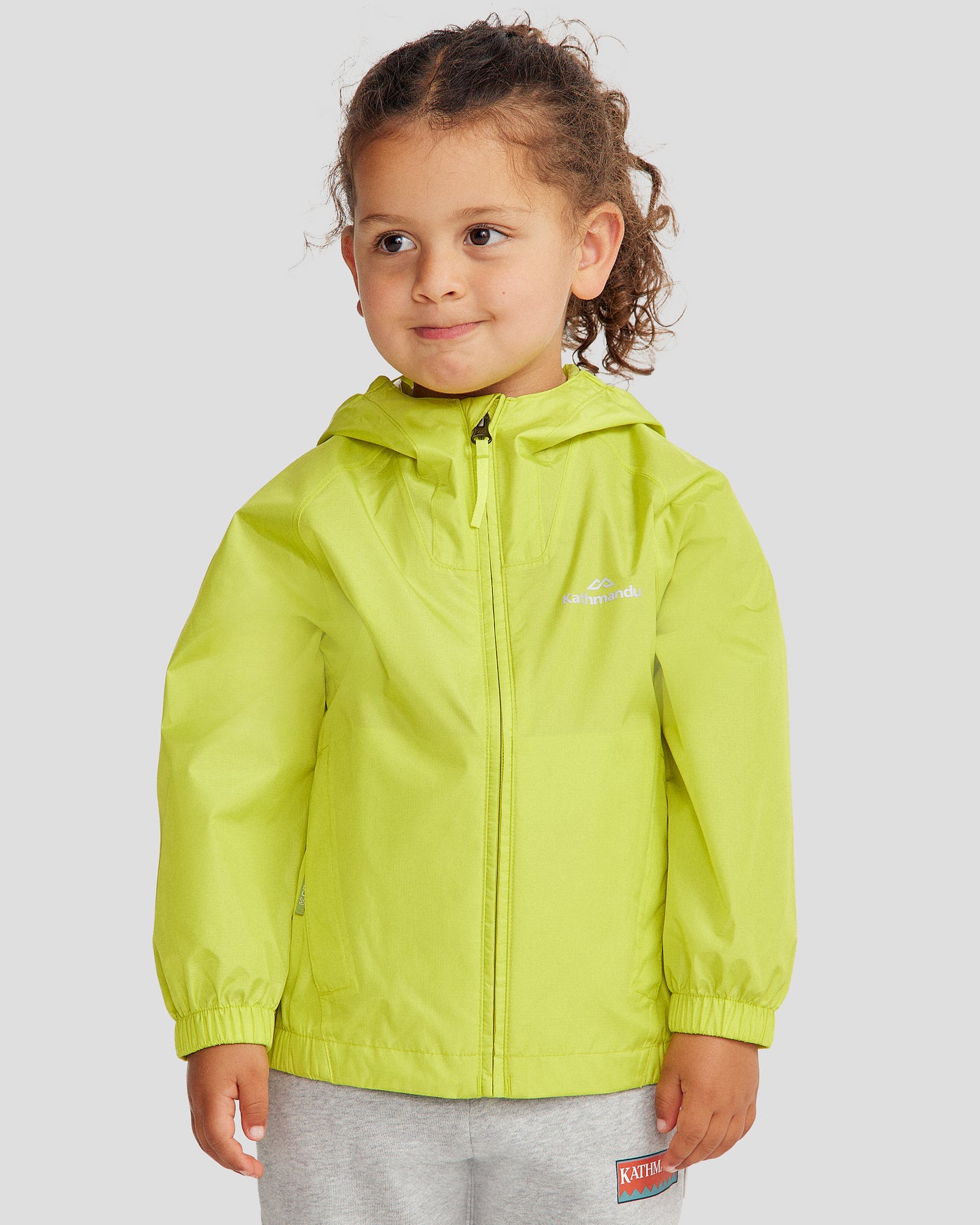 a1394_olg_pocket_it_2l_kids_rain_jacket_v4_green_m_a_1745458714000