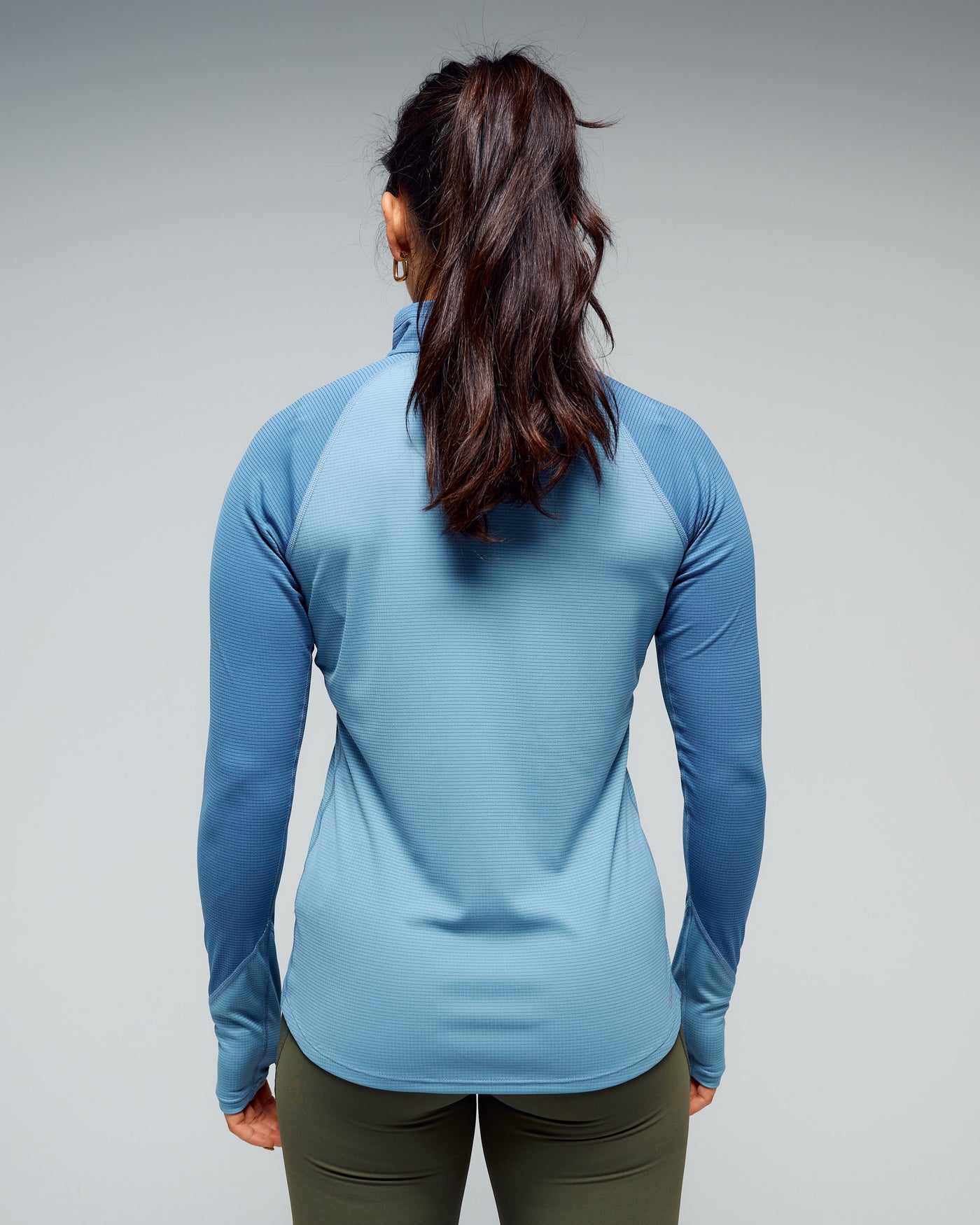 b1173_nwy_womens_kmd_action_quarter_zip_baselayer_top_f_1768348918000